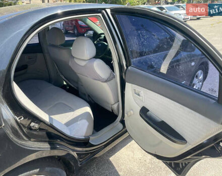 Черный Киа Черато, объемом двигателя 1.59 л и пробегом 210 тыс. км за 4100 $, фото 10 на Automoto.ua