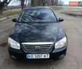 Чорний Кіа Черато, об'ємом двигуна 1.59 л та пробігом 184 тис. км за 4600 $, фото 1 на Automoto.ua