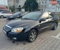 Черный Киа Черато, объемом двигателя 1.59 л и пробегом 208 тыс. км за 3800 $, фото 3 на Automoto.ua
