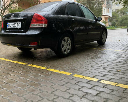Чорний Кіа Черато, об'ємом двигуна 1.59 л та пробігом 232 тис. км за 4000 $, фото 6 на Automoto.ua