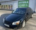 Черный Киа Черато, объемом двигателя 1.6 л и пробегом 260 тыс. км за 4000 $, фото 1 на Automoto.ua