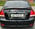 Черный Киа Черато, объемом двигателя 1.59 л и пробегом 316 тыс. км за 4400 $, фото 3 на Automoto.ua