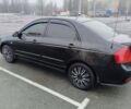 Черный Киа Черато, объемом двигателя 2 л и пробегом 307 тыс. км за 4200 $, фото 8 на Automoto.ua