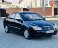 Черный Киа Черато, объемом двигателя 1.6 л и пробегом 210 тыс. км за 3750 $, фото 1 на Automoto.ua