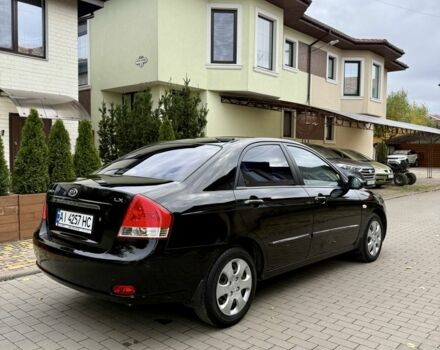 Чорний Кіа Черато, об'ємом двигуна 1.6 л та пробігом 320 тис. км за 3500 $, фото 5 на Automoto.ua