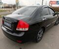 Чорний Кіа Черато, об'ємом двигуна 1.6 л та пробігом 224 тис. км за 4900 $, фото 23 на Automoto.ua