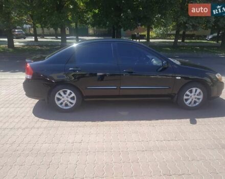Черный Киа Черато, объемом двигателя 1.6 л и пробегом 179 тыс. км за 5100 $, фото 6 на Automoto.ua