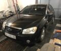 Чорний Кіа Черато, об'ємом двигуна 1.6 л та пробігом 241 тис. км за 3500 $, фото 1 на Automoto.ua