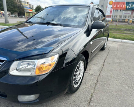 Чорний Кіа Черато, об'ємом двигуна 1.6 л та пробігом 272 тис. км за 5200 $, фото 5 на Automoto.ua