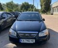 Чорний Кіа Черато, об'ємом двигуна 1.6 л та пробігом 106 тис. км за 5300 $, фото 23 на Automoto.ua