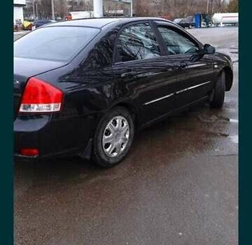 Черный Киа Черато, объемом двигателя 1.6 л и пробегом 221 тыс. км за 4900 $, фото 1 на Automoto.ua