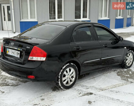 Чорний Кіа Черато, об'ємом двигуна 2 л та пробігом 258 тис. км за 2900 $, фото 3 на Automoto.ua