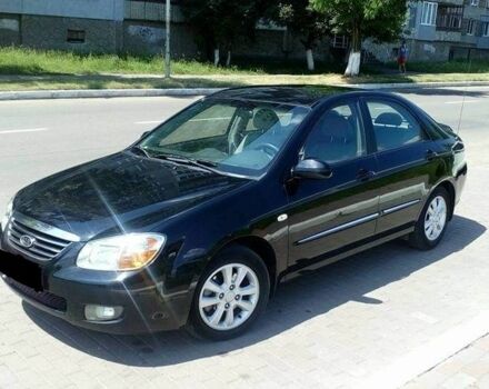 Черный Киа Черато, объемом двигателя 2 л и пробегом 240 тыс. км за 4700 $, фото 1 на Automoto.ua