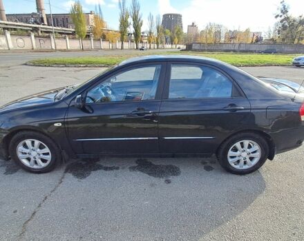 Черный Киа Черато, объемом двигателя 1.6 л и пробегом 258 тыс. км за 4300 $, фото 1 на Automoto.ua