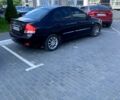 Черный Киа Черато, объемом двигателя 2 л и пробегом 192 тыс. км за 4700 $, фото 1 на Automoto.ua