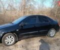Черный Киа Черато, объемом двигателя 1.98 л и пробегом 174 тыс. км за 5900 $, фото 1 на Automoto.ua