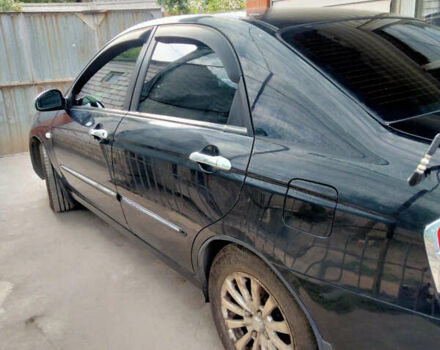 Чорний Кіа Черато, об'ємом двигуна 1.59 л та пробігом 255 тис. км за 5000 $, фото 1 на Automoto.ua