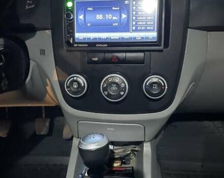 Черный Киа Черато, объемом двигателя 1.59 л и пробегом 273 тыс. км за 4200 $, фото 11 на Automoto.ua