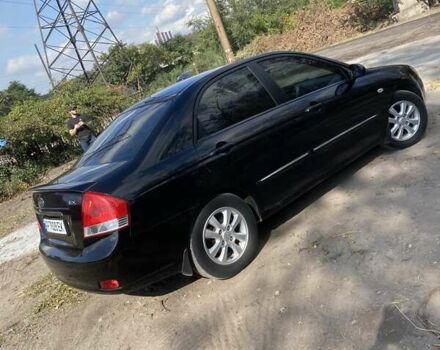 Чорний Кіа Черато, об'ємом двигуна 1.6 л та пробігом 157 тис. км за 5800 $, фото 6 на Automoto.ua