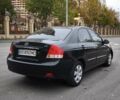 Чорний Кіа Черато, об'ємом двигуна 1.6 л та пробігом 204 тис. км за 3700 $, фото 2 на Automoto.ua
