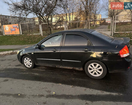 Черный Киа Черато, объемом двигателя 1.6 л и пробегом 294 тыс. км за 3500 $, фото 5 на Automoto.ua
