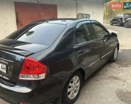 Черный Киа Черато, объемом двигателя 1.6 л и пробегом 230 тыс. км за 4950 $, фото 2 на Automoto.ua