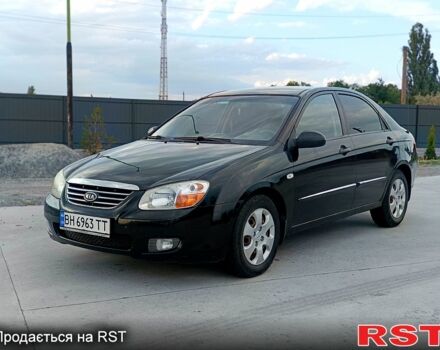 Черный Киа Черато, объемом двигателя 1.6 л и пробегом 210 тыс. км за 4000 $, фото 6 на Automoto.ua