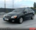 Черный Киа Черато, объемом двигателя 1.6 л и пробегом 210 тыс. км за 4000 $, фото 6 на Automoto.ua
