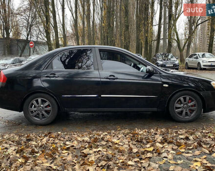 Черный Киа Черато, объемом двигателя 1.98 л и пробегом 306 тыс. км за 3800 $, фото 2 на Automoto.ua