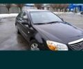 Черный Киа Черато, объемом двигателя 1.6 л и пробегом 221 тыс. км за 4900 $, фото 2 на Automoto.ua