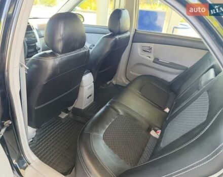 Черный Киа Черато, объемом двигателя 1.59 л и пробегом 219 тыс. км за 4600 $, фото 38 на Automoto.ua
