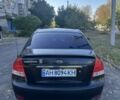 Чорний Кіа Черато, об'ємом двигуна 2 л та пробігом 310 тис. км за 3400 $, фото 5 на Automoto.ua