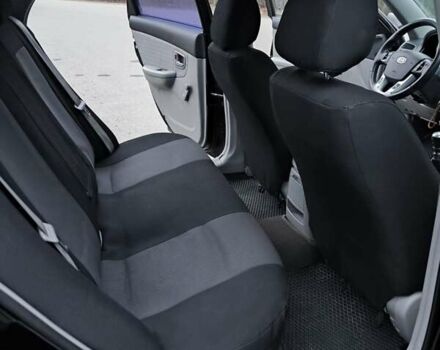 Чорний Кіа Черато, об'ємом двигуна 1.59 л та пробігом 300 тис. км за 4550 $, фото 18 на Automoto.ua