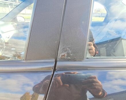 Черный Киа Черато, объемом двигателя 1.6 л и пробегом 258 тыс. км за 4300 $, фото 4 на Automoto.ua