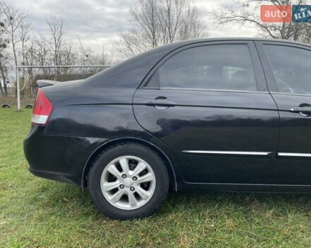 Черный Киа Черато, объемом двигателя 1.98 л и пробегом 315 тыс. км за 5745 $, фото 6 на Automoto.ua