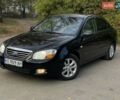 Черный Киа Черато, объемом двигателя 2 л и пробегом 173 тыс. км за 4800 $, фото 2 на Automoto.ua