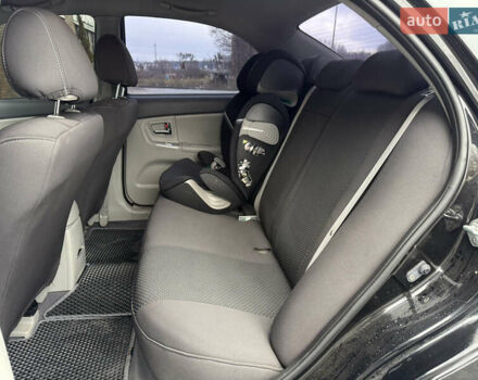 Черный Киа Черато, объемом двигателя 1.98 л и пробегом 180 тыс. км за 5500 $, фото 34 на Automoto.ua