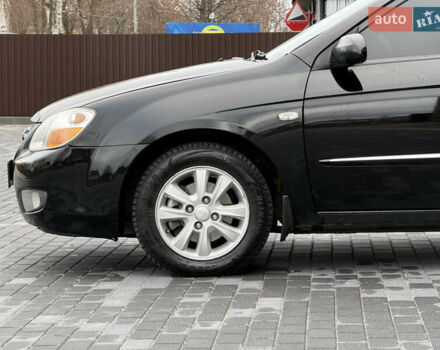 Черный Киа Черато, объемом двигателя 1.98 л и пробегом 180 тыс. км за 5500 $, фото 6 на Automoto.ua