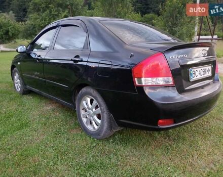 Черный Киа Черато, объемом двигателя 1.59 л и пробегом 237 тыс. км за 3900 $, фото 26 на Automoto.ua