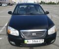 Черный Киа Черато, объемом двигателя 2 л и пробегом 186 тыс. км за 6350 $, фото 1 на Automoto.ua