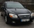 Черный Киа Черато, объемом двигателя 2 л и пробегом 208 тыс. км за 5000 $, фото 1 на Automoto.ua