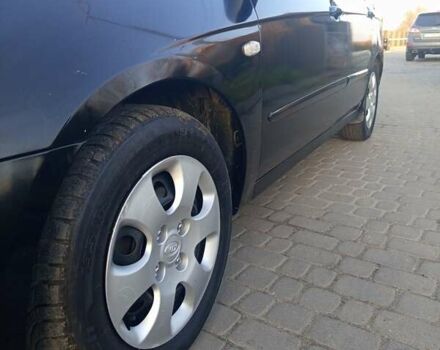 Чорний Кіа Черато, об'ємом двигуна 1.6 л та пробігом 232 тис. км за 4250 $, фото 8 на Automoto.ua