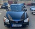 Черный Киа Черато, объемом двигателя 1.6 л и пробегом 190 тыс. км за 4500 $, фото 1 на Automoto.ua