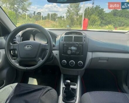 Черный Киа Черато, объемом двигателя 1.6 л и пробегом 160 тыс. км за 3500 $, фото 1 на Automoto.ua