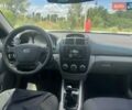 Черный Киа Черато, объемом двигателя 1.6 л и пробегом 160 тыс. км за 3500 $, фото 1 на Automoto.ua