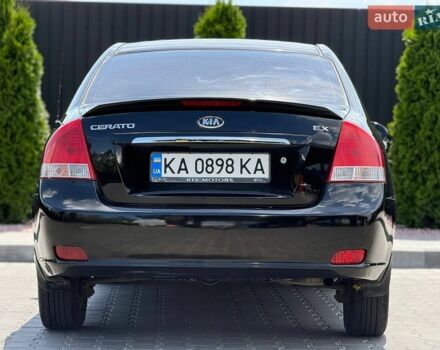 Чорний Кіа Черато, об'ємом двигуна 2 л та пробігом 242 тис. км за 4999 $, фото 3 на Automoto.ua