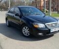 Черный Киа Черато, объемом двигателя 1.6 л и пробегом 184 тыс. км за 5300 $, фото 1 на Automoto.ua