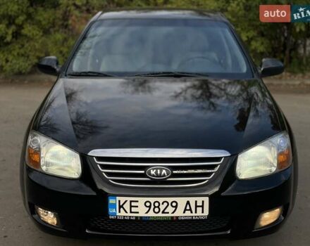 Черный Киа Черато, объемом двигателя 2 л и пробегом 173 тыс. км за 4800 $, фото 1 на Automoto.ua