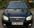 Черный Киа Черато, объемом двигателя 2 л и пробегом 173 тыс. км за 4800 $, фото 1 на Automoto.ua