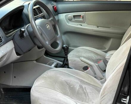 Черный Киа Черато, объемом двигателя 1.6 л и пробегом 239 тыс. км за 5140 $, фото 6 на Automoto.ua